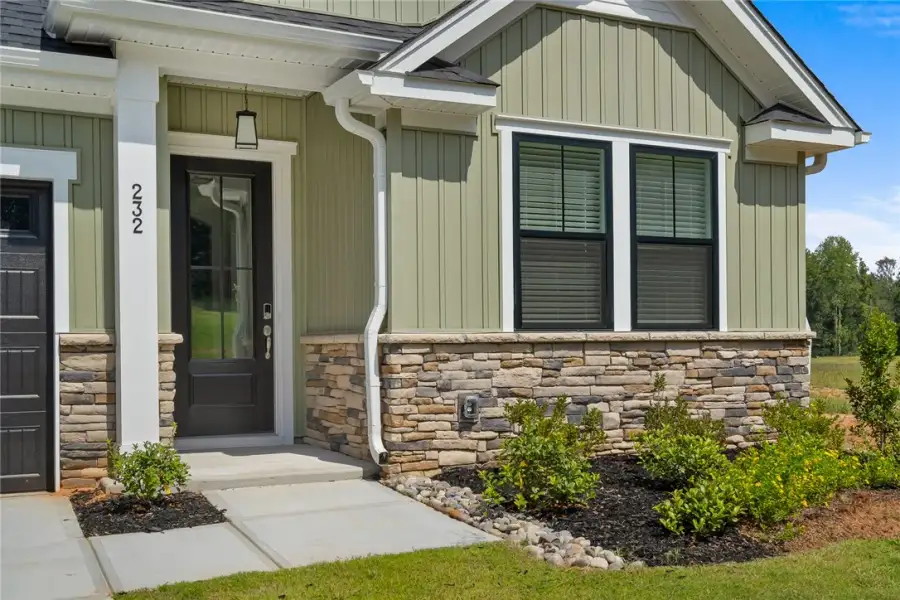 Exterior details and patio area of a home in Saratoga Oaks, Williamston (Image 3). Exterior details and patio area of a home in Saratoga Oaks, Williamston (Image 3).
