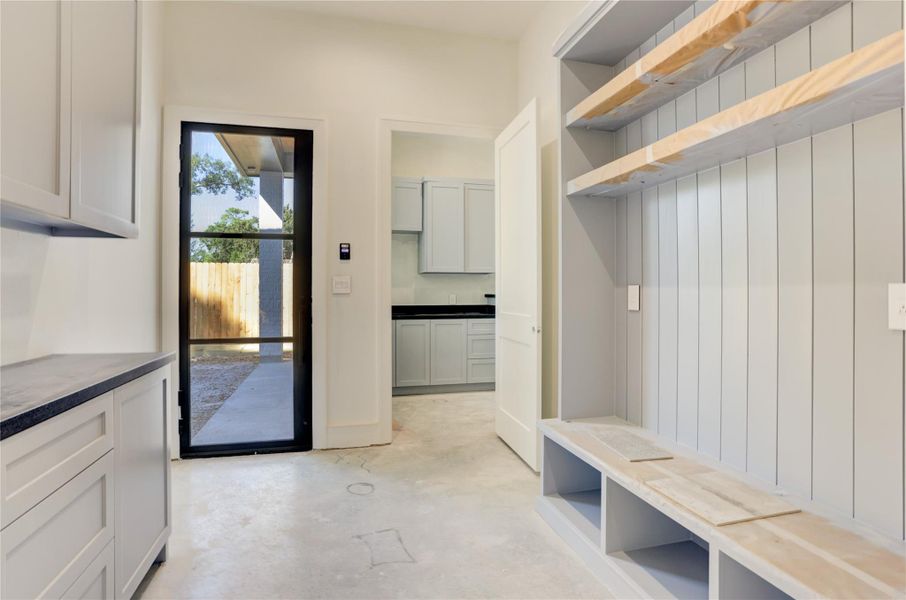 Drop zone right off the two car garage and pedestrian door to the driveway and third garage. Downstairs utility room with plenty of storage and half bath for convenience. Drop zone right off the two car garage and pedestrian door to the driveway and third garage. Downstairs utility room with plenty of storage and half bath for convenience.