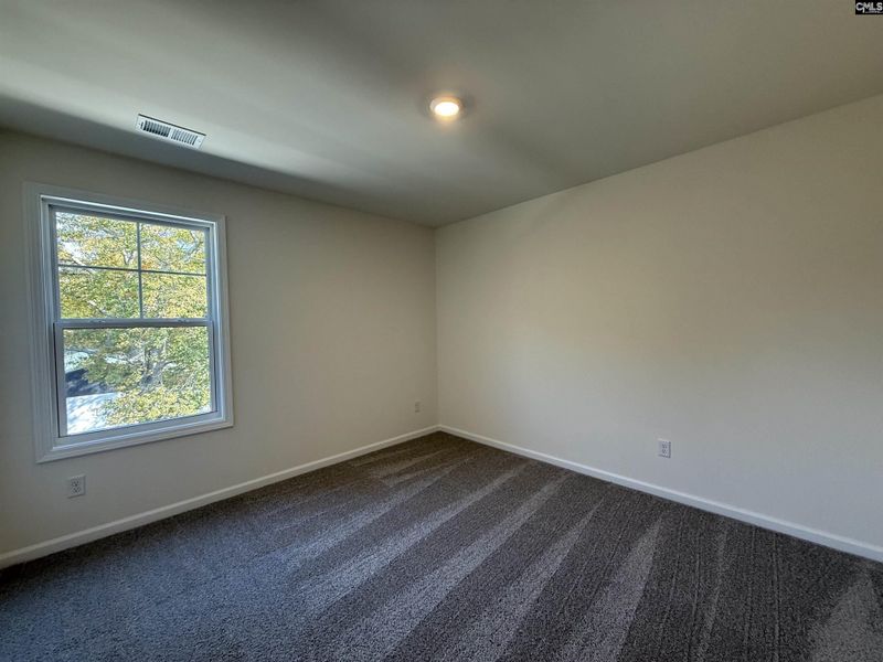 Spacious, unfurnished interior of a new home in Dunbar Village, Cayce (Image 36).