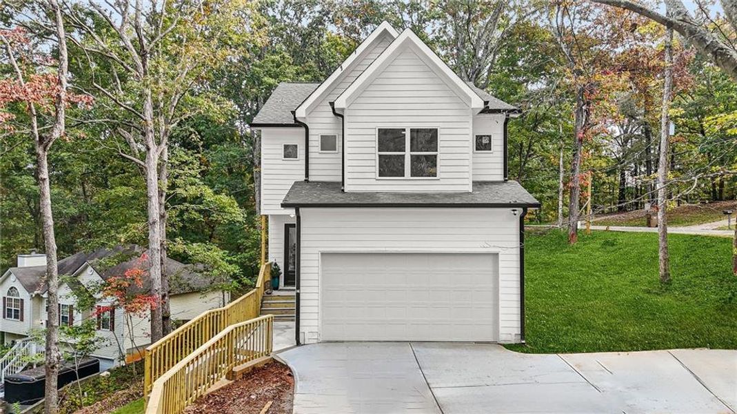 Front exterior of a new home in , Gainesville, GA, highlighting curb appeal (Image 21).