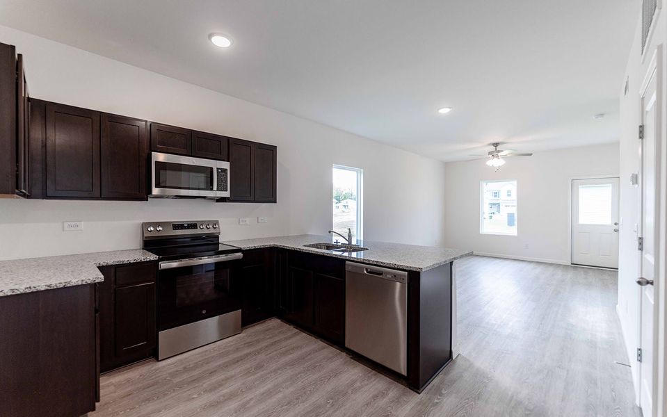 Furnished interior view inside a new home in Stonehenge, Manchester (Image 3).