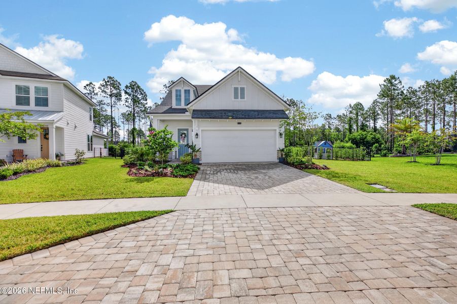 Front exterior of a new home in , Ponte Vedra, FL, highlighting curb appeal (Image 25).