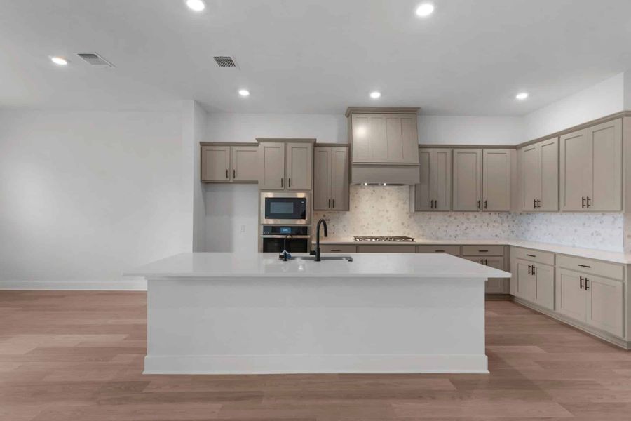 Representative furnished interior of a home built from the Hudson by Chesmar Homes in New Haven, Manor (Image 6).