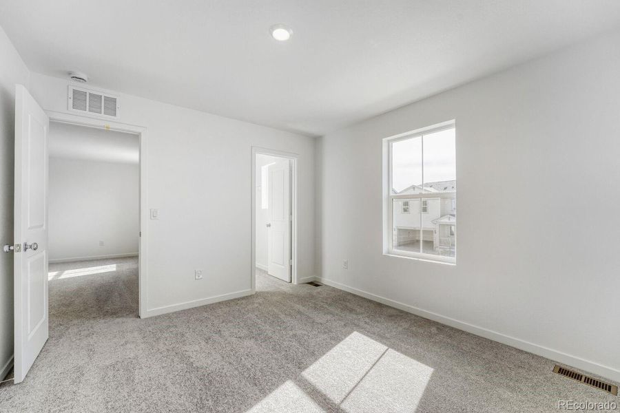 Spacious, unfurnished interior of a new home in Muegge Farms, Bennett (Image 9).