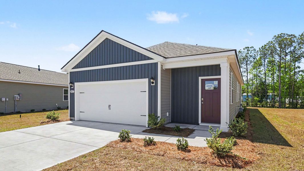 Front exterior of a new home in Evington Place, Longs, SC, highlighting curb appeal (Image 16).