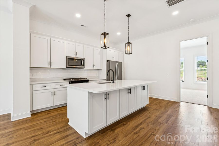 Large kitchen island with storage on back of island!