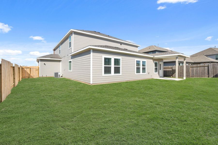 Exterior details and patio area of a home in Trails at Woodhaven, La Marque (Image 3).