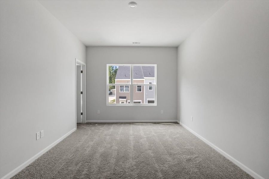 Spacious, unfurnished interior of a new home in Renaissance at White Oak, Garner (Image 15).