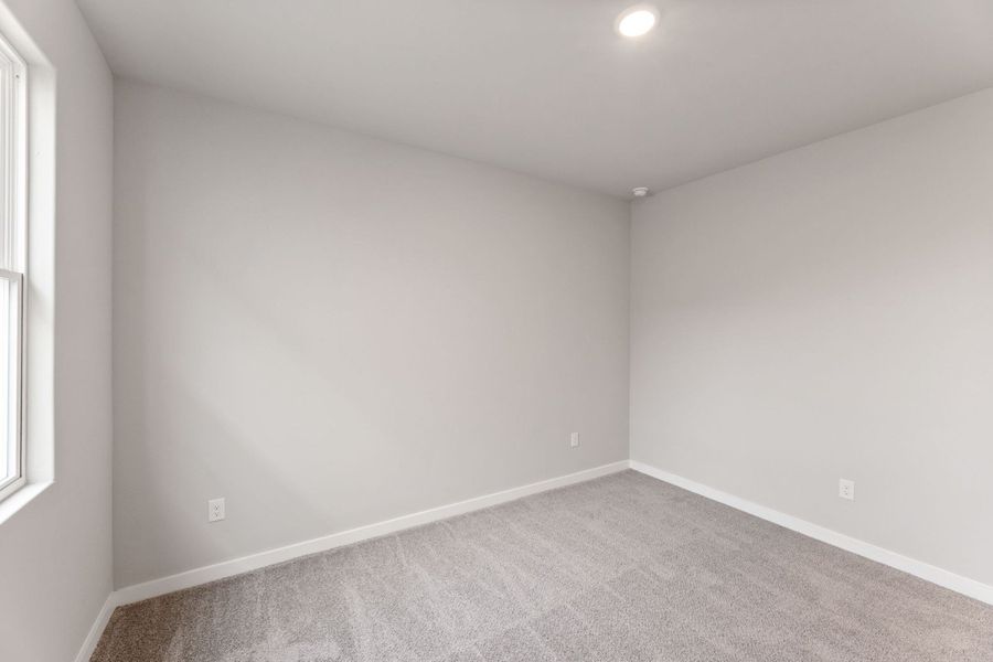 Spacious, unfurnished interior of a new home in Hunters Ranch, San Antonio (Image 23).