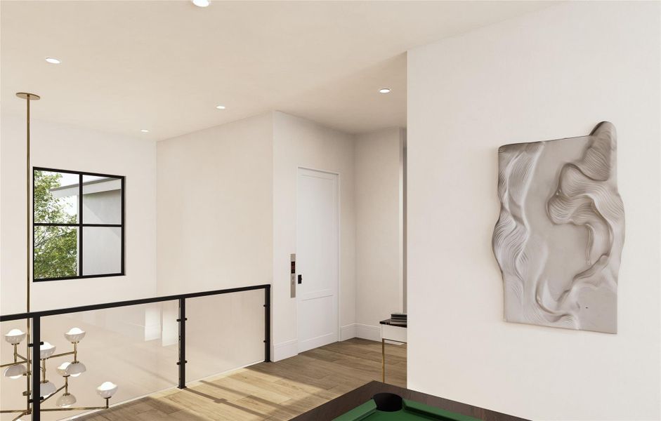 This upstairs landing captures the flow and fluidity of the home’s interior design. Framed with glass railing and elevated with natural wood flooring, the space features clean lines, organic textures, and elevator access for daily ease. Artful accents and soft lighting complete the transition with polish. Notice the elevators central location in the hallway.