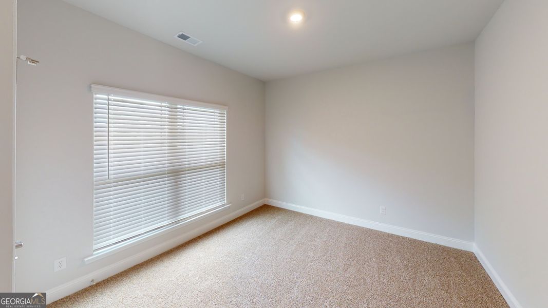 Spacious, unfurnished interior of a new home in Holliday Pass, Griffin (Image 22).