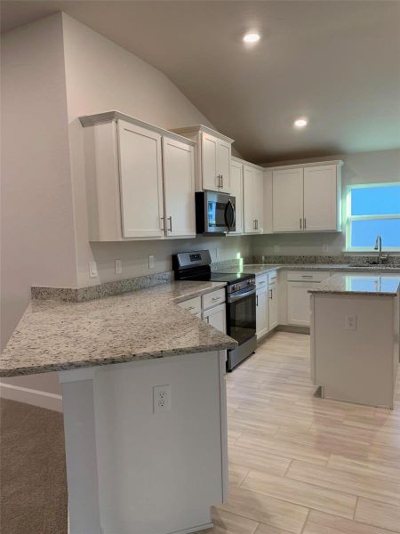 Furnished interior view inside a new home in Twisted Oaks, Beverly Hills (Image 5).