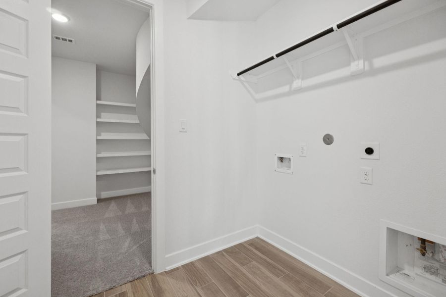 Experience convenience with the in-house utility room, thoughtfully designed with a dedicated laundry area.