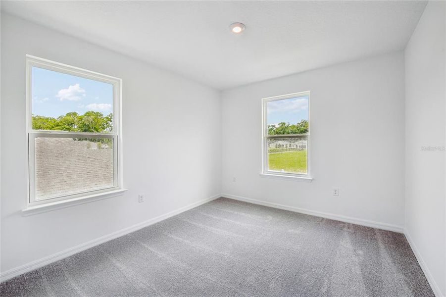 Spacious, unfurnished interior of a new home in Brack Ranch, St. Cloud (Image 34).
