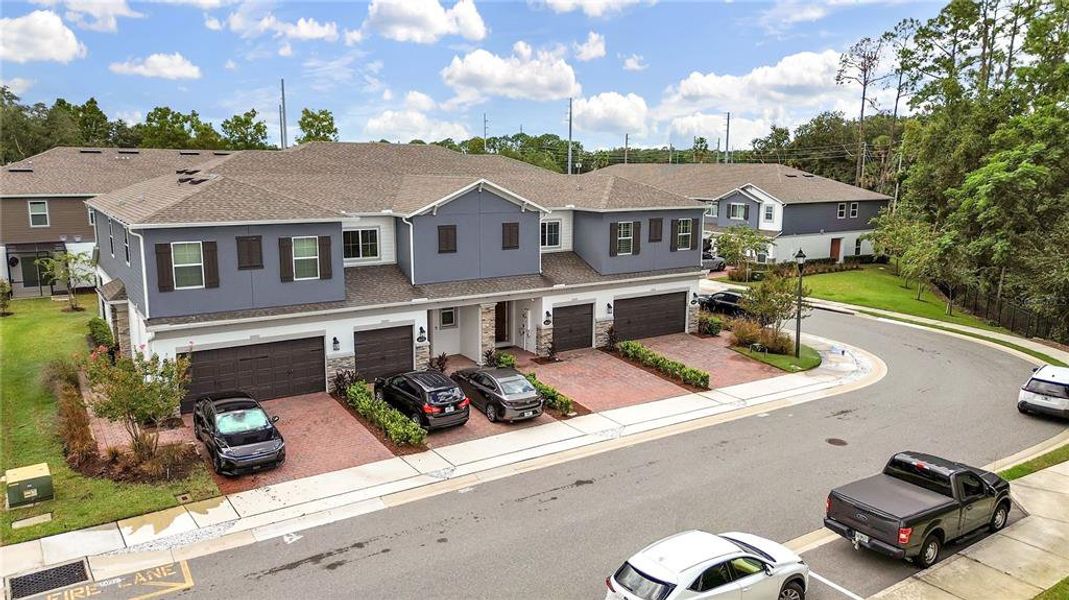 Front exterior of a new home in , Oviedo, FL, highlighting curb appeal (Image 27).