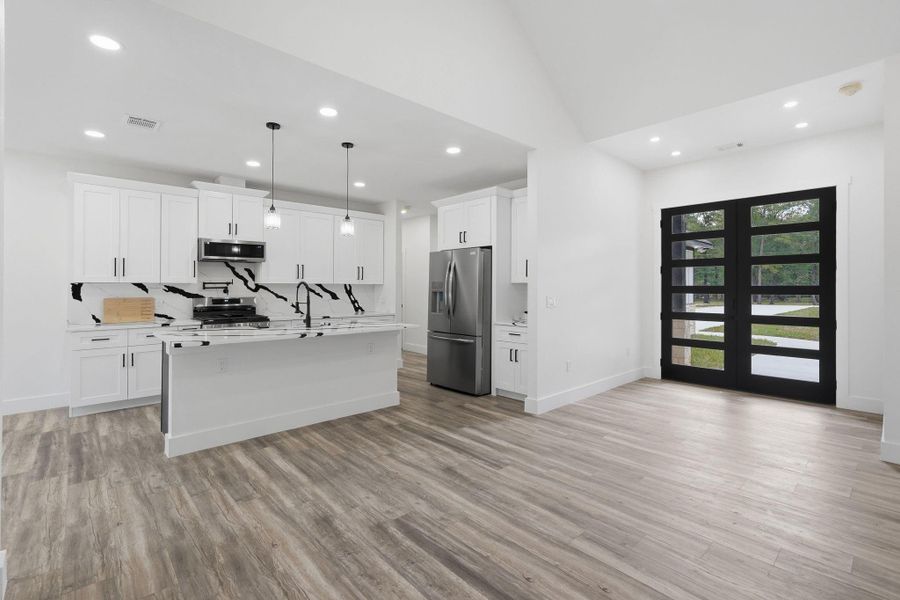 Furnished interior view inside a new home in , Conroe (Image 5).