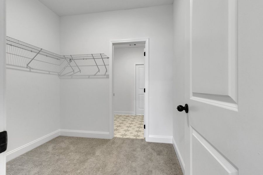 Representative unfurnished interior of a home built from the Titusville II by Regent Homes in Marlon's Creek, Spring Hill (Image 30).