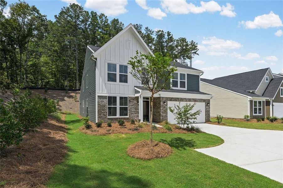Front exterior of a new home in Easton Park, Dallas, GA, highlighting curb appeal (Image 24).