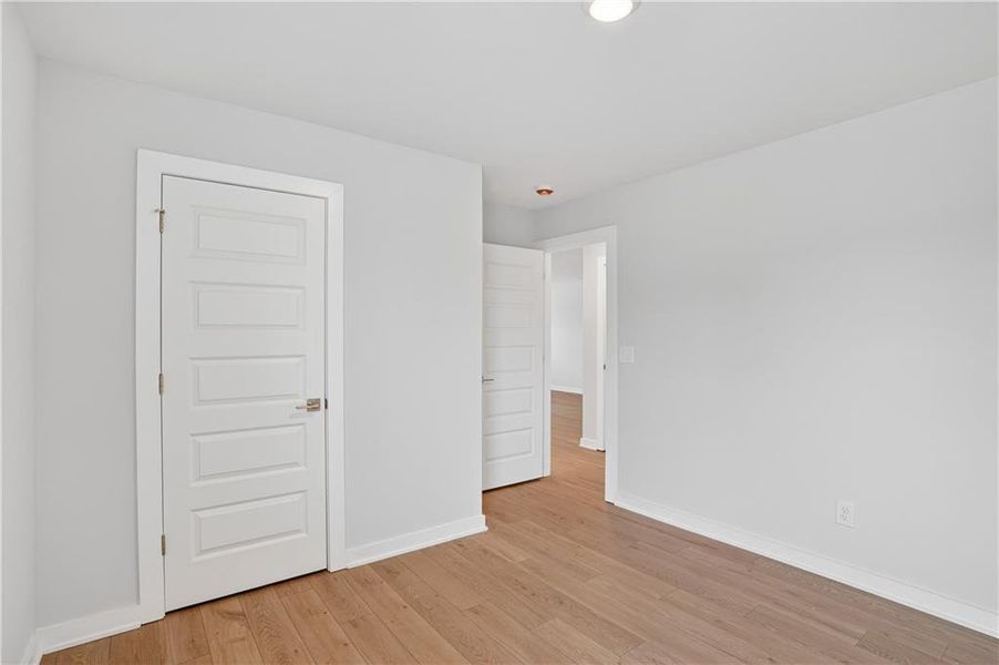 Spacious, unfurnished interior of a new home in The Fairways at Mirror Lake, Villa Rica (Image 14).