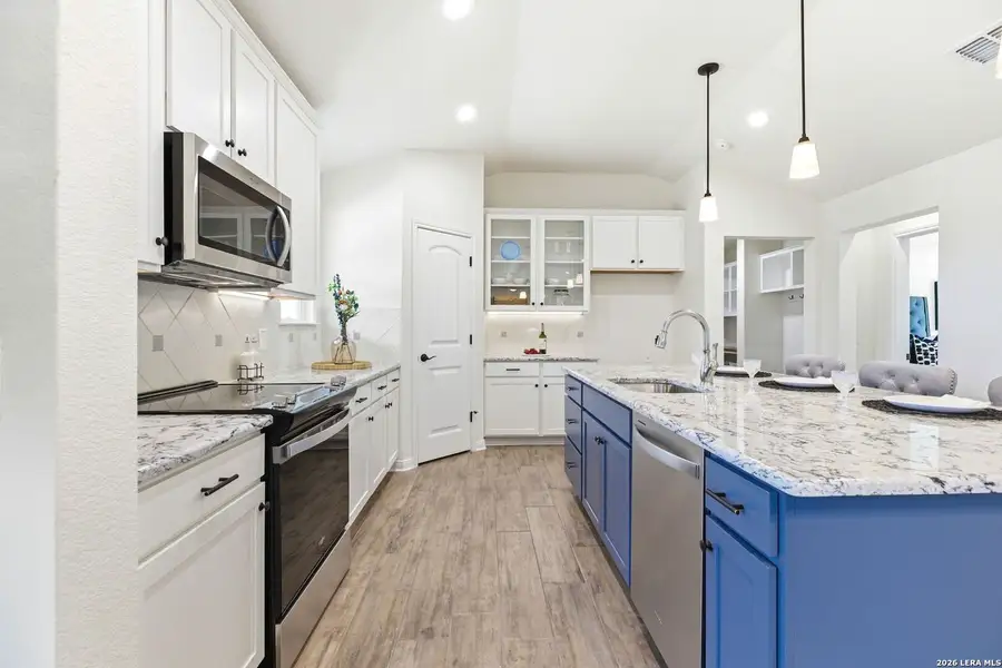 Furnished interior view inside a new home in , Fischer (Image 6).