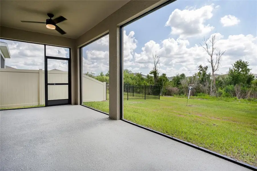Exterior details and patio area of a home in Bella Lago, Parrish (Image 3). Exterior details and patio area of a home in Bella Lago, Parrish (Image 3).