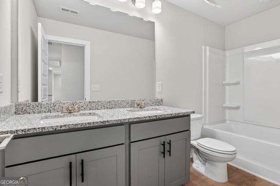 Furnished interior view inside a new home in Killian Manor at The Adares, Adairsville (Image 11).