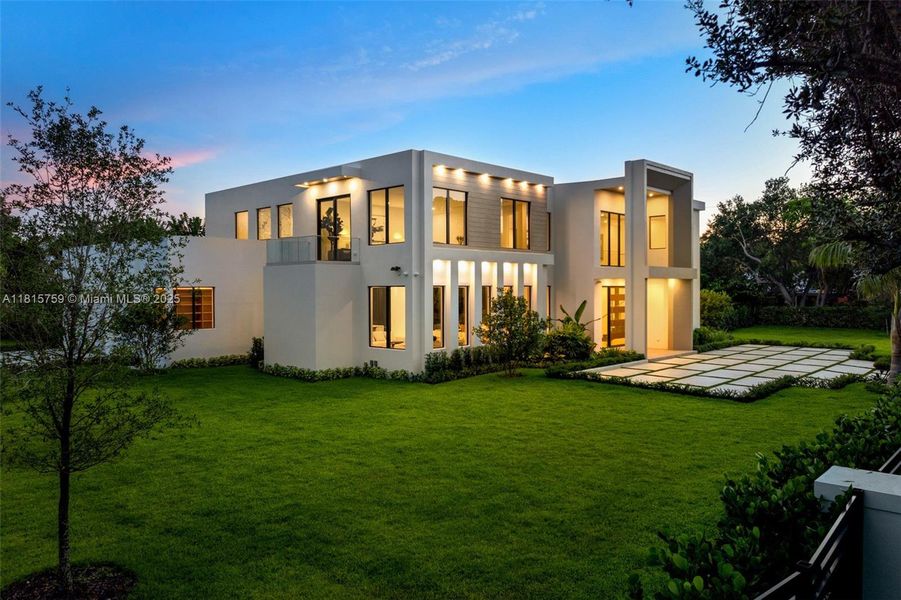 Front exterior of a new home in , Pinecrest, FL, highlighting curb appeal (Image 26).
