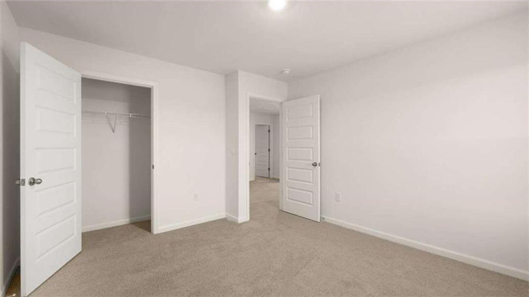 Spacious, unfurnished interior of a new home in Preserve at Dove Creek, Statham (Image 18).