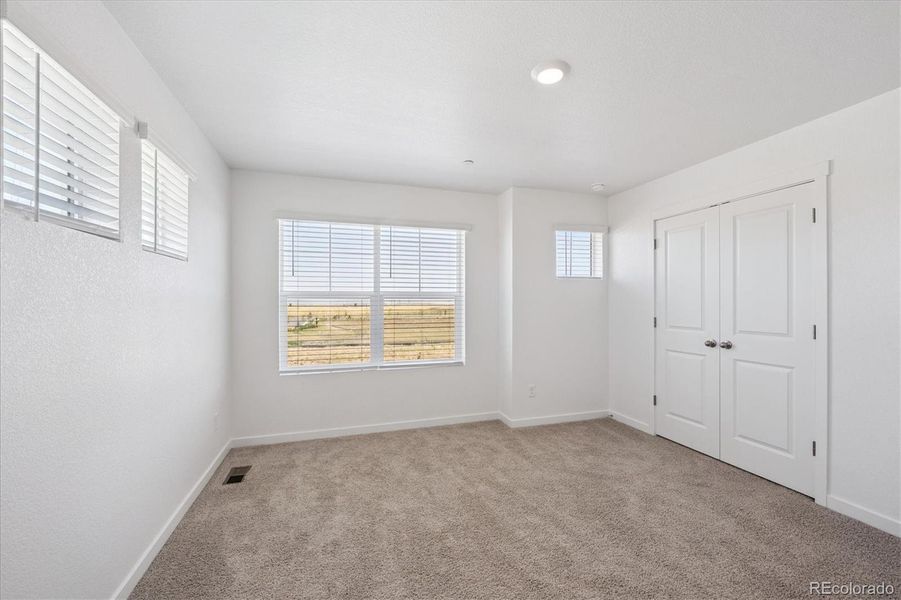 Spacious, unfurnished interior of a new home in Settlers Crossing, Commerce City (Image 25).