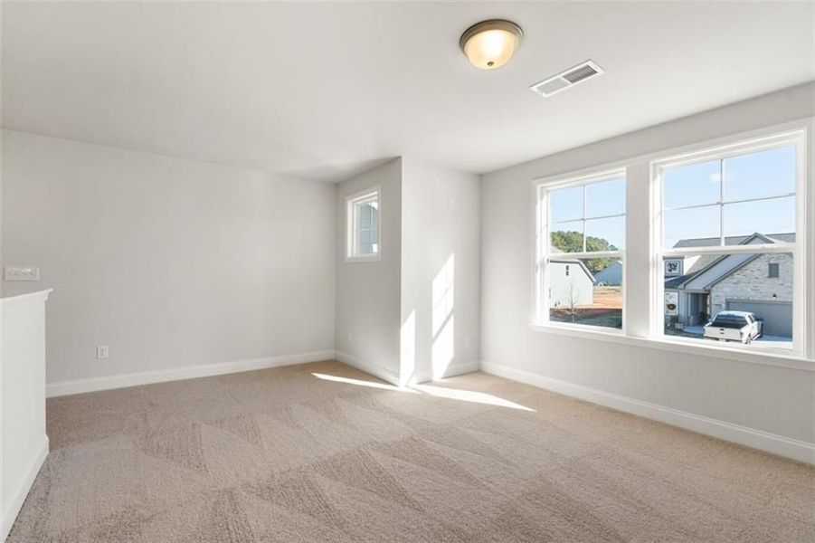 Spacious, unfurnished interior of a new home in Wehunt Meadows, Hoschton (Image 110).