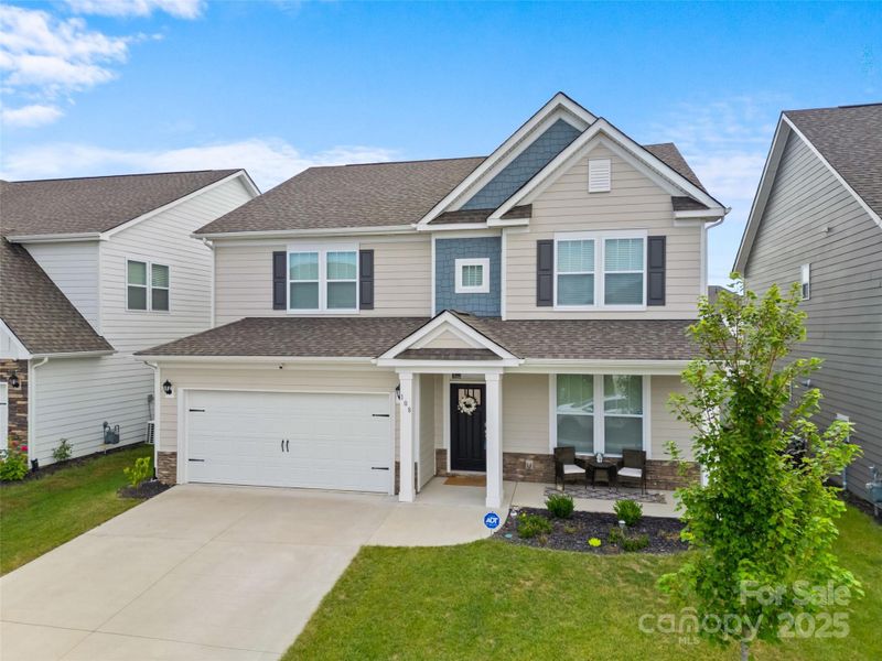 Front exterior of a new home in , Hendersonville, NC, highlighting curb appeal (Image 22).