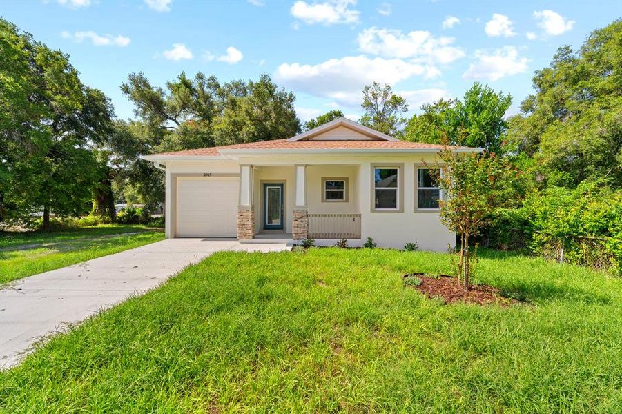 Front exterior of a new home in , Tampa, FL, highlighting curb appeal (Image 2). Front exterior of a new home in , Tampa, FL, highlighting curb appeal (Image 2).