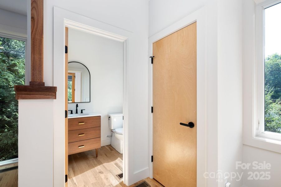 Inviting Foyer with Coat Closet and Powder Room Inviting Foyer with Coat Closet and Powder Room