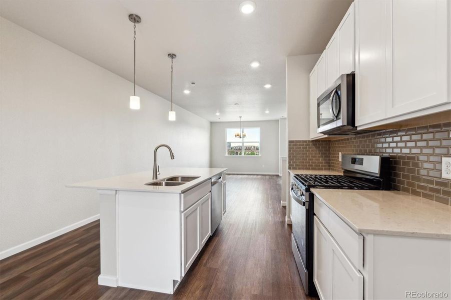 Furnished interior view inside a new home in Townhome Collection at Grand Vue at Interlocken, Broomfield (Image 5).