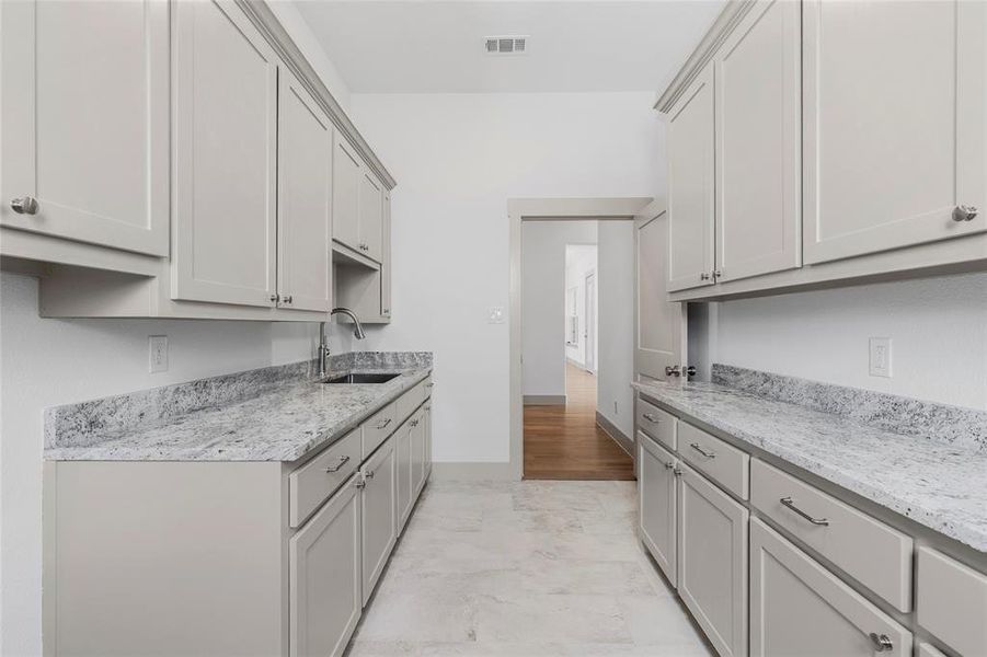 Spacious utility room with ample storage