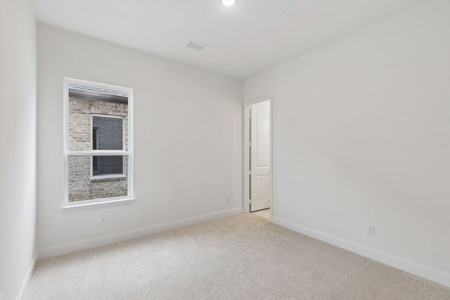 Representative unfurnished interior of a home built from the Pecos by Sandlin Homes in Settler's Glen, New Fairview (Image 27).