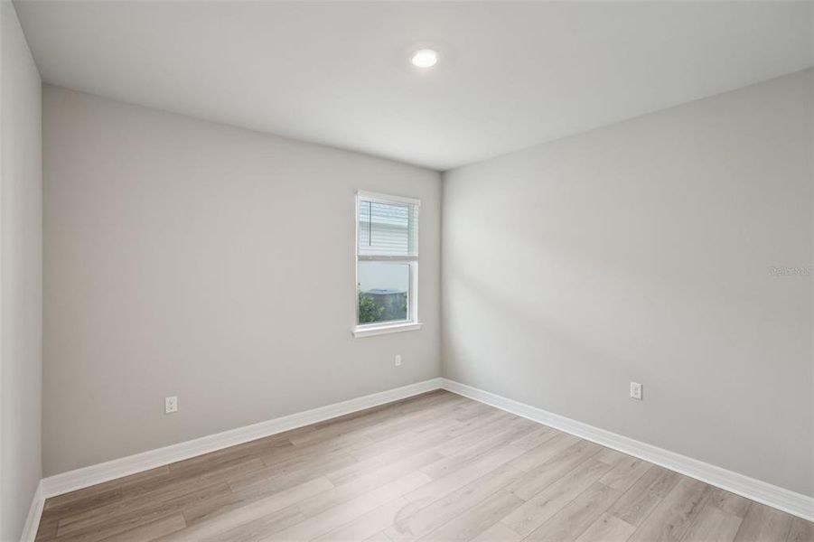 Spacious, unfurnished interior of a new home in Crescent Lakes - Signature Series, Punta Gorda (Image 14).