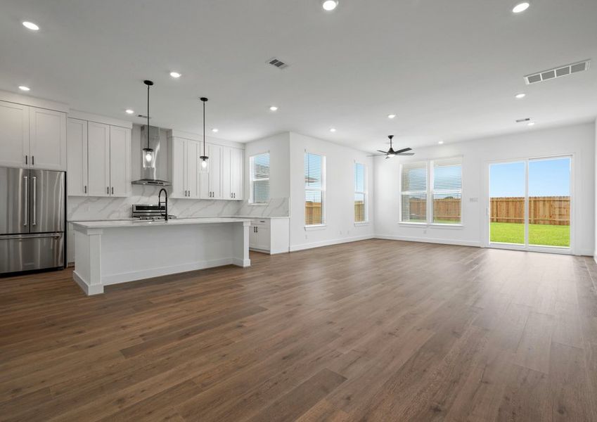 The living room is located off the kitchen.