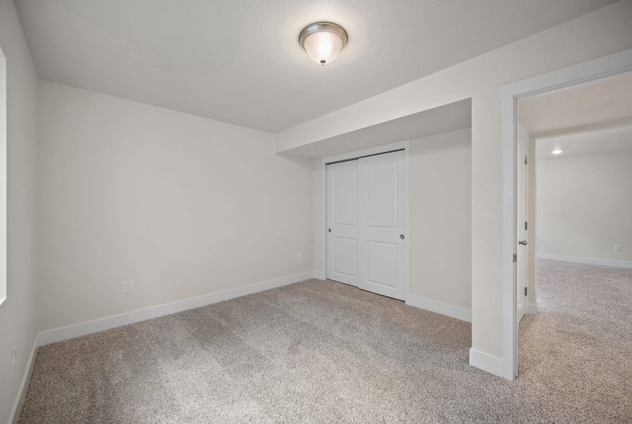 Spacious, unfurnished interior of a new home in Ridge at Lorson Ranch, Colorado Springs (Image 30).