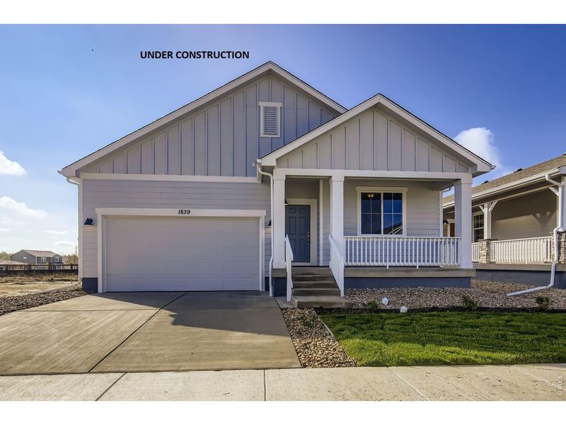 Front exterior of a new home in Farmstead, Berthoud, CO, highlighting curb appeal (Image 2). Front exterior of a new home in Farmstead, Berthoud, CO, highlighting curb appeal (Image 2).