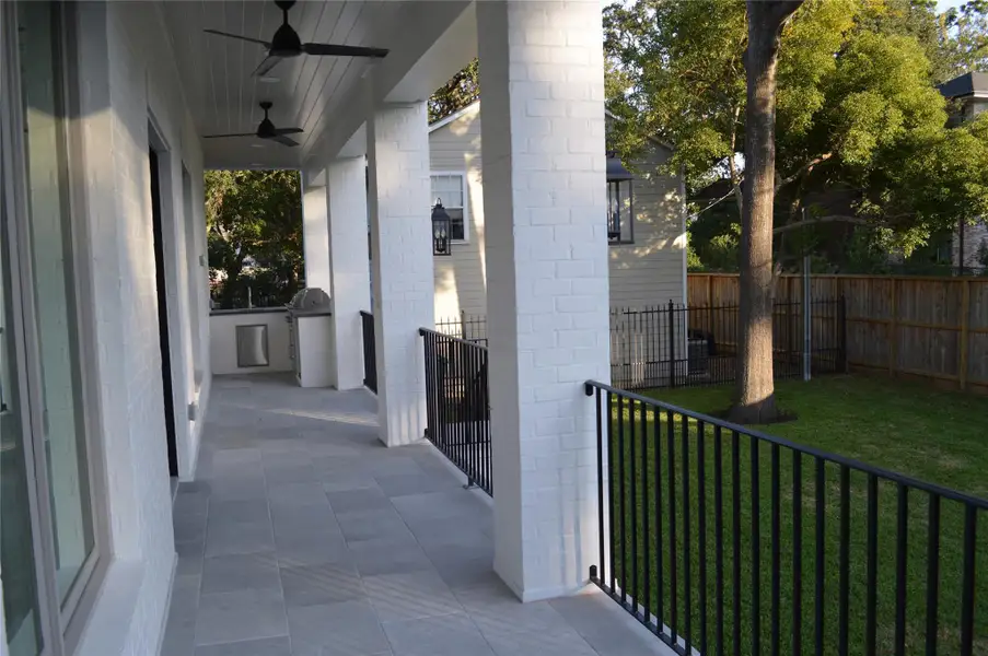 Exterior details and patio area of a home in , Houston (Image 3).