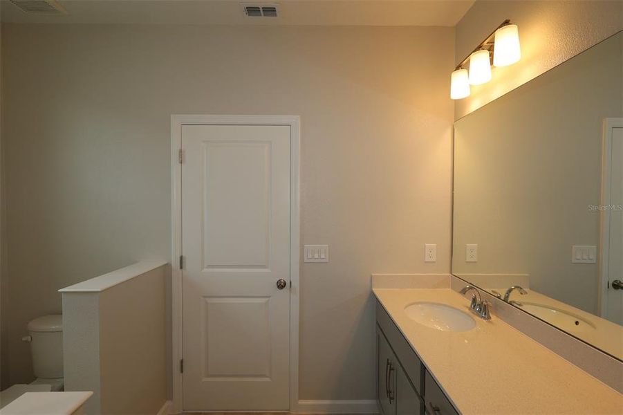 Furnished interior view inside a new home in Center Lake on the Park, St. Cloud (Image 11).