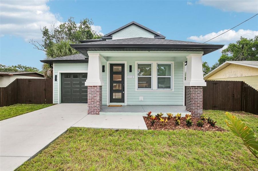 Front exterior of a new home in , Tampa, FL, highlighting curb appeal (Image 26). Front exterior of a new home in , Tampa, FL, highlighting curb appeal (Image 26).