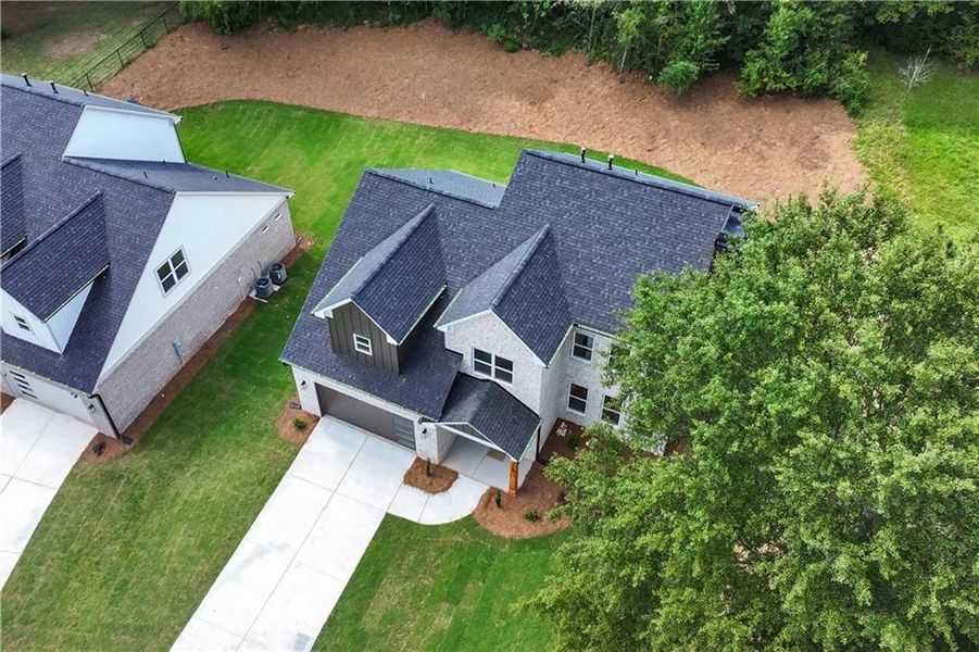 Front exterior of a new home in , Lawrenceville, GA, highlighting curb appeal (Image 28).