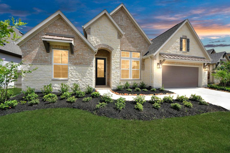 Front exterior of a new home in ARTAVIA: Hilltop Collection, Conroe, TX, highlighting curb appeal (Image 2). Front exterior of a new home in ARTAVIA: Hilltop Collection, Conroe, TX, highlighting curb appeal (Image 2).
