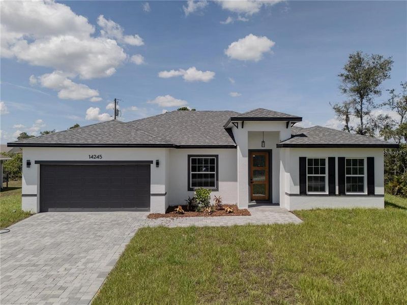 Front exterior of a new home in , Ocala, FL, highlighting curb appeal (Image 28). Front exterior of a new home in , Ocala, FL, highlighting curb appeal (Image 28).