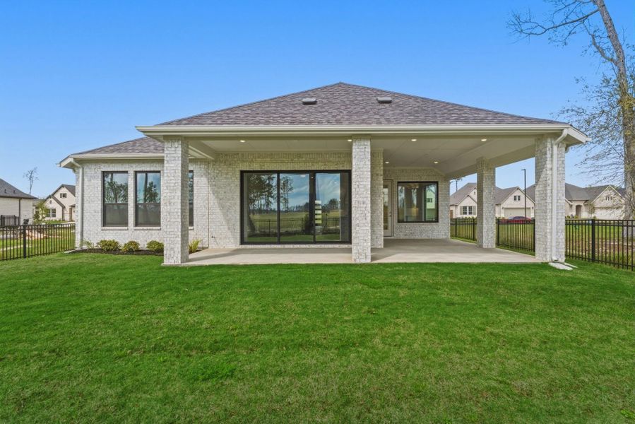 Exterior details and patio area of a home in The Highlands, Porter (Image 21).