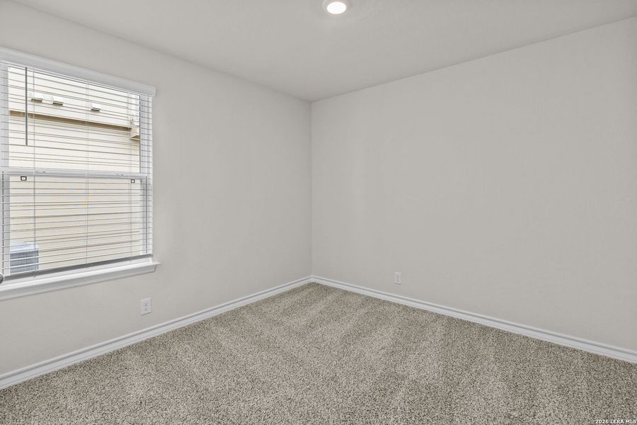 Spacious, unfurnished interior of a new home in Brookstone Creek, San Antonio (Image 22).