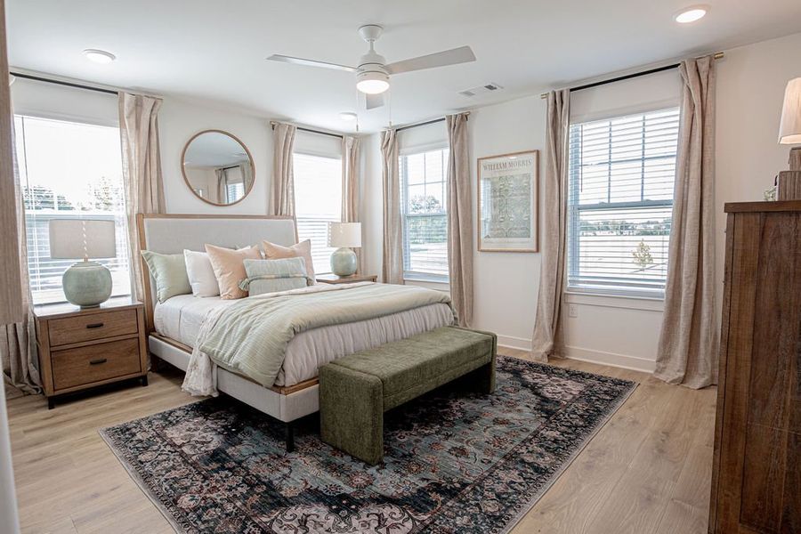 Representative furnished interior of a home built from the Provost by Grant & Co in The Townhomes at Union Depot, Bartlett (Image 29).