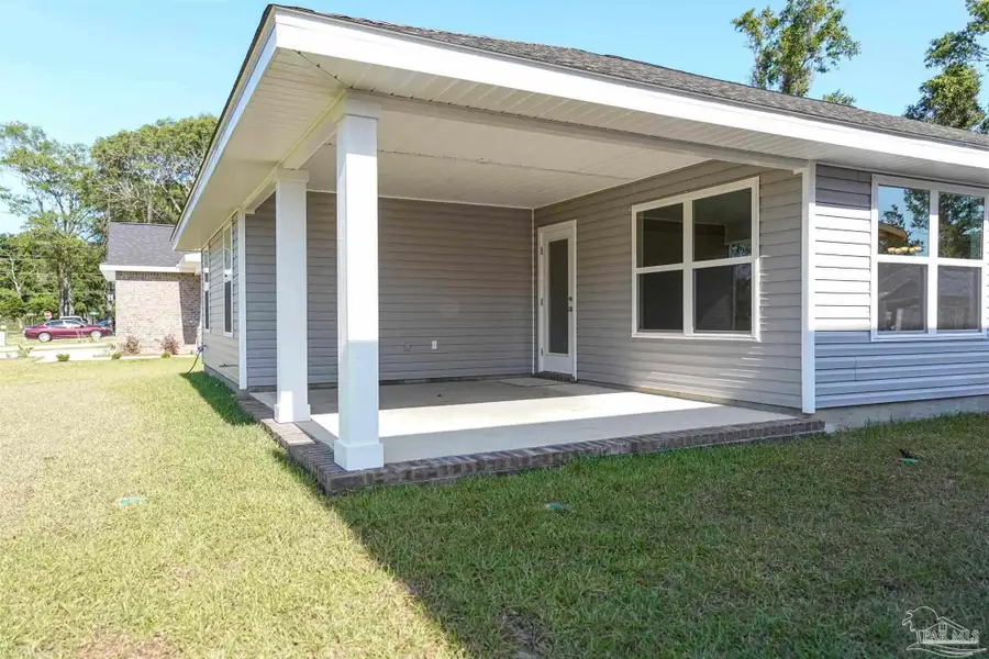 Exterior details and patio area of a home in Pine Top, Cantonment (Image 3). Exterior details and patio area of a home in Pine Top, Cantonment (Image 3).
